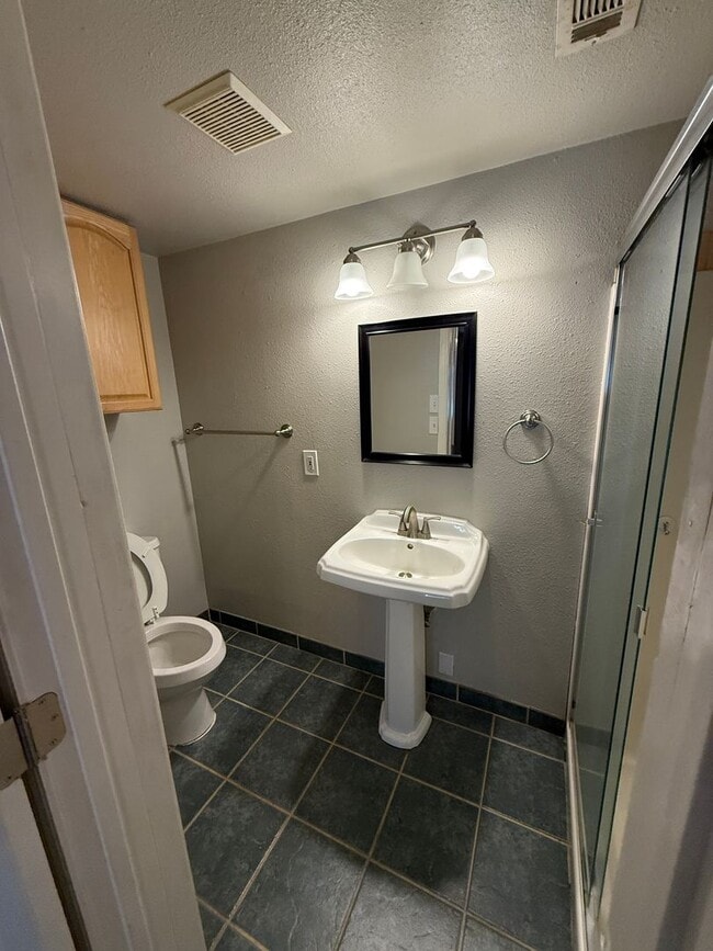 Building Photo - Peaceful Setting with Central Location!