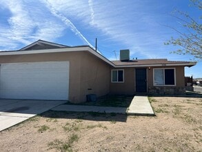 Building Photo - 3 Bedroom 2 Bathroom House with 2 Car Garage