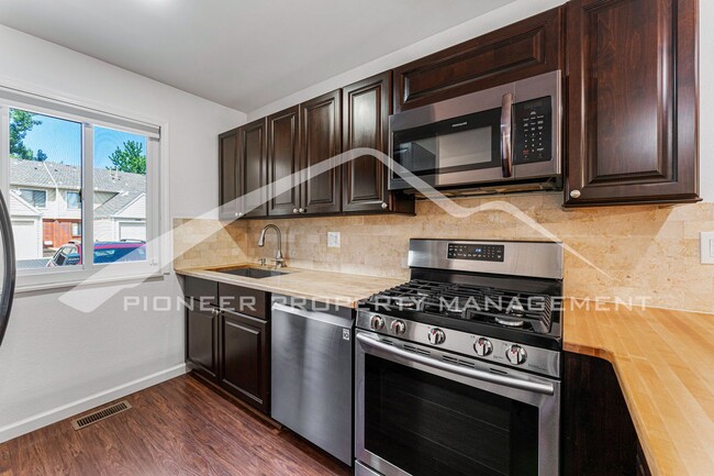 Building Photo - Spacious Condo with Patio and Central AC