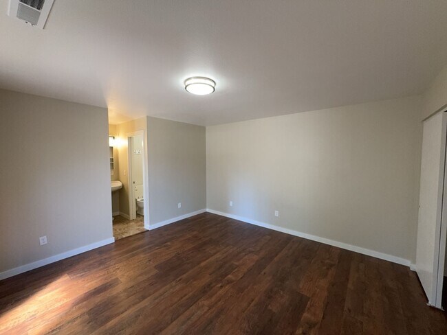 Building Photo - Newley updated 3-bedroom home features fenced yard, garage, and covered patios!