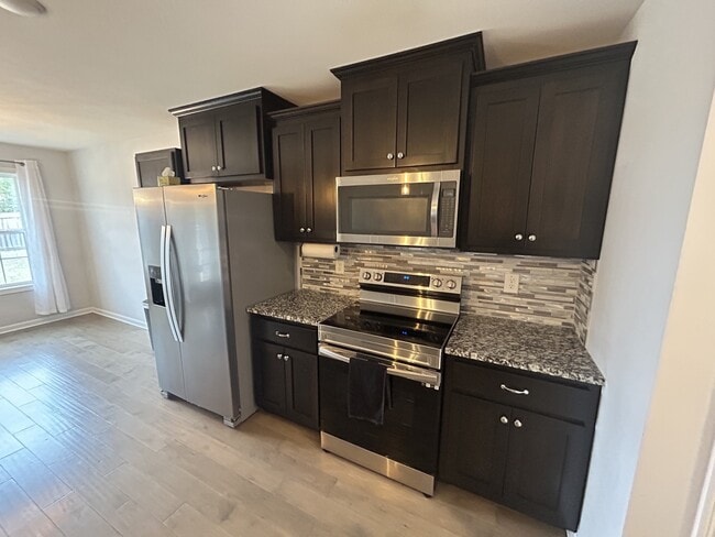 Building Photo - 721 Tidwell Dr