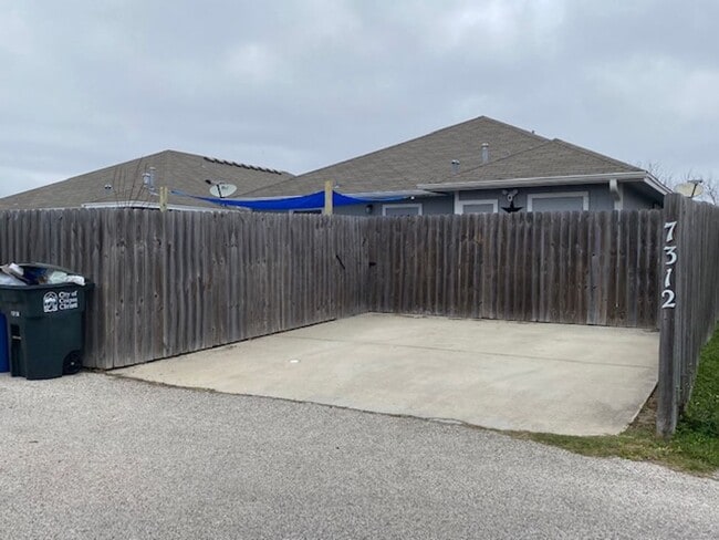 Building Photo - WELCOME TO YOUR CHARMING HOME AT THE COTTA...