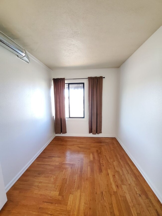 Building Photo - Spacious apartment! First Month FREE with 12 month lease!