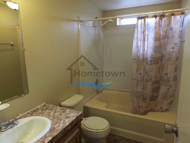 Building Photo - 2 Bed 1 Bath Mobile with Fenced Yard and Storage Shed!