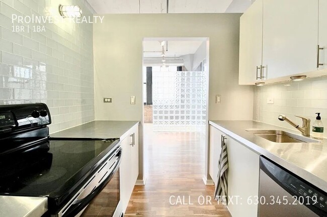 Building Photo - Available Now! Sprawling Sun-drenched 1Bed...