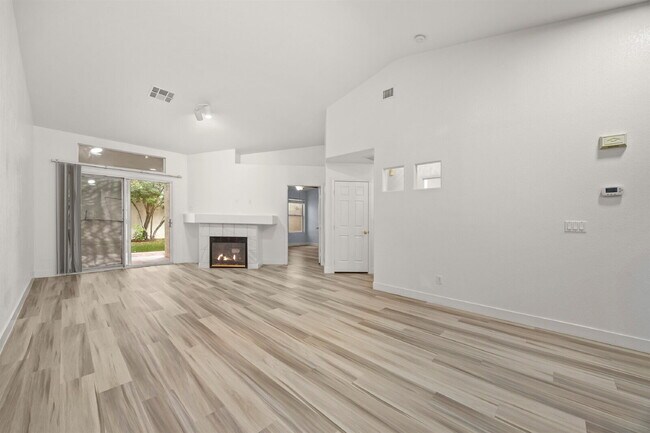 Building Photo - Charming and spacious single-story townhome nestled within a gated community in the desirable Nor...