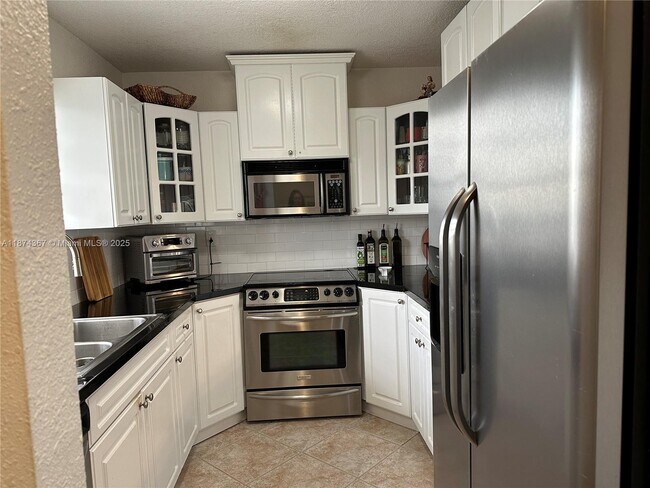 Building Photo - 15969 NW 64th Ave