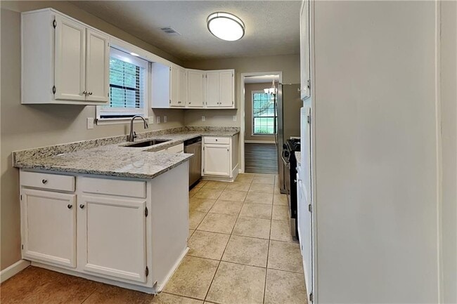 Building Photo - 5580 Dorsett Shoals Ln