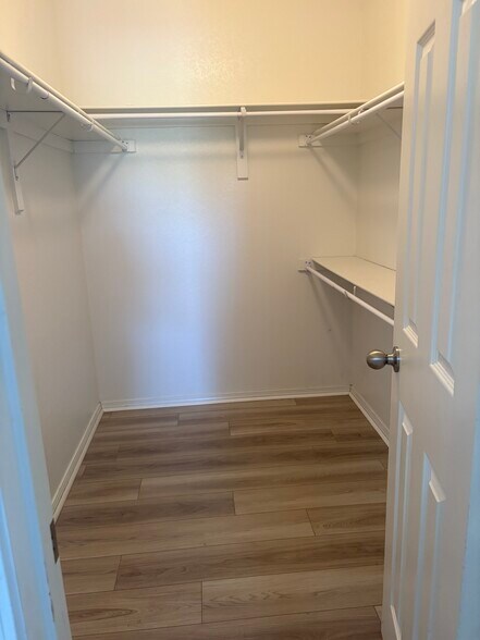 Master bedroom first of TWO walk-in closets - 4208 SW Fieldstone Blvd