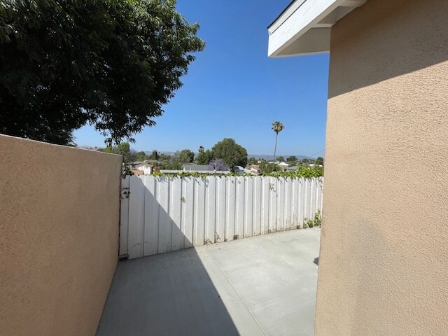 view from side yard looking at back - 2615 Elizondo Ave