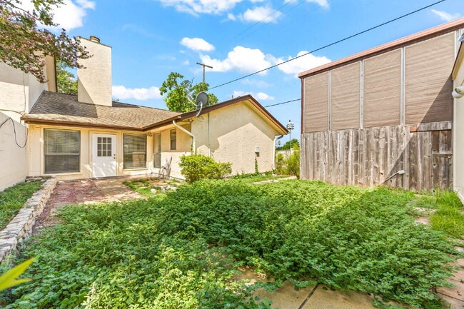 Building Photo - "Charming garden home offers 3-Bedroom Sanctuary with Cozy Fireplace in San Antonio – 1710 Sq Ft ...
