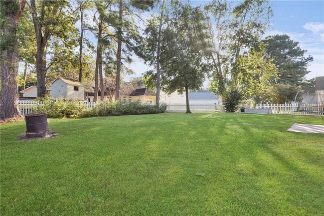 Building Photo - 4-Bedroom Home in Wild Heron with Front Porch and Fenced Yard