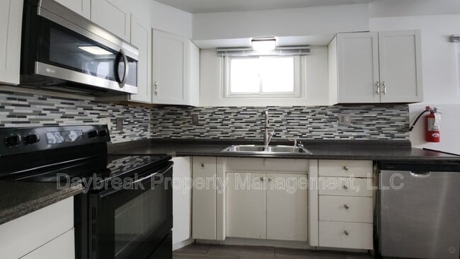 Building Photo - 1201-11 1/2 11 1/2 St N