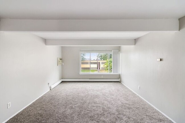 Building Photo - *Beautiful Apartment in Park Like Setting* Updated Shaker Cabinets and Appliances HEAT included