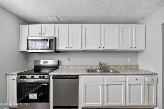 Building Photo - 6955 Miss Muffet Ln S