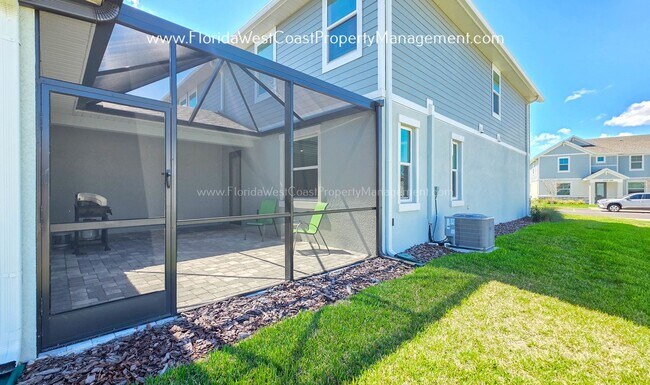 Building Photo - EXCEPTIONAL AND SPACIOUS FURNISHED TOWNHOME WITHIN WATERSIDE- NAUTIQUE!