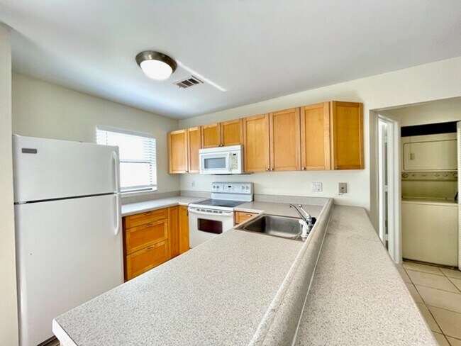 Building Photo - CENTRALLY LOCATED- UPDATED UNFURNISHED ANNUAL RENTAL