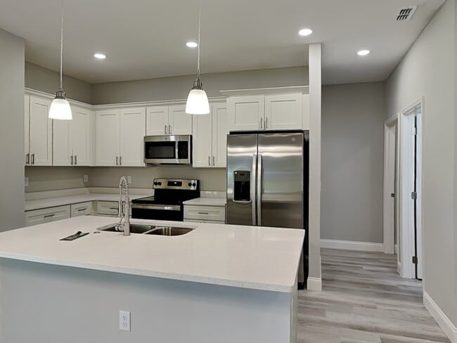 Building Photo - 7669 N Paris Dr