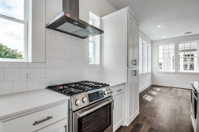 Building Photo - Welcome to a beautiful Craftsman-style Tow...