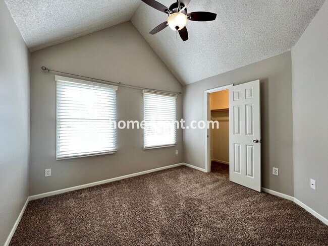 Building Photo - Updated Kitchen, Large Two Tiered Deck, Finished Basement in Blue Valley Schools!