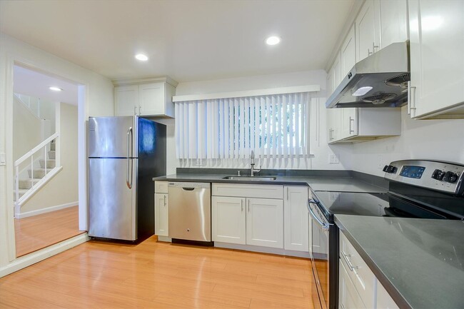 Building Photo - Remodeled townhouse with AC, Top Cupertino...