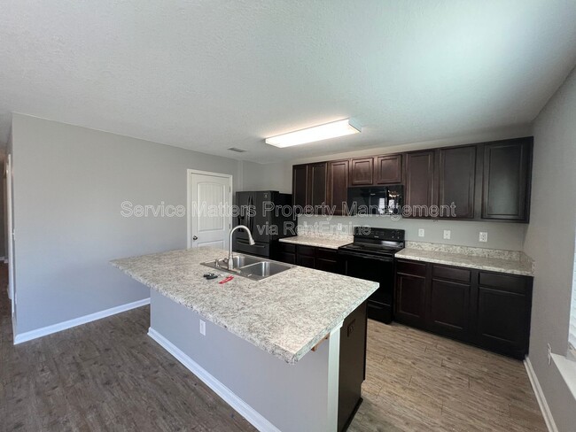 Building Photo - 5881 Old Plantation Court