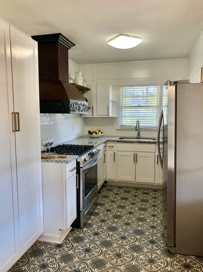 Building Photo - Renovated Farmhouse Inspired Brick Ranch