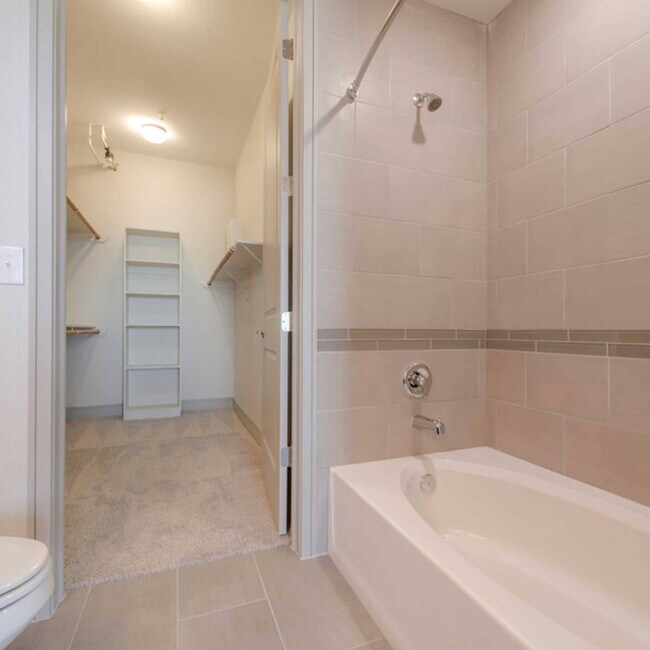 Building Photo - Experience the Art of Fine Apartment Living!