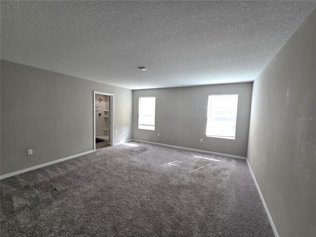 Building Photo - 5694 Arlington River Dr.