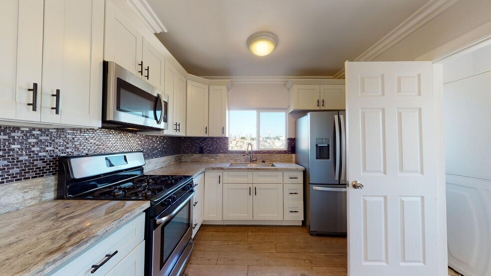 Building Photo - Modern & Spacious Home in East LA – Great Value and Prime Location!