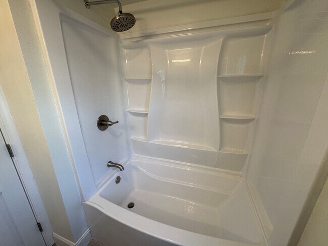 Building Photo - RENOVATED 3 bedroom end unit across the street from the Beach!