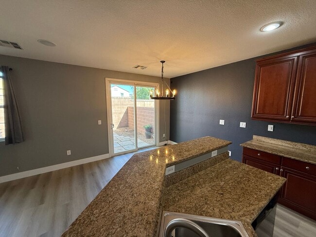Building Photo - Beautiful 2-Story Townhome in Gated Area w...