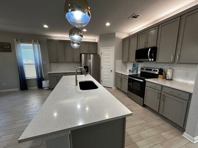 Building Photo - Move In Today and Save Big — Half-Month FREE!