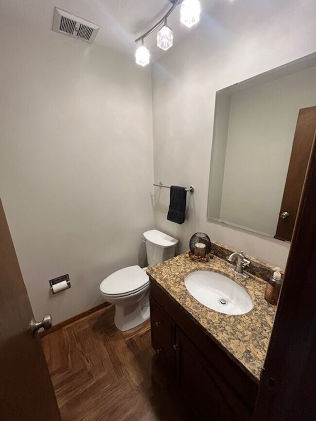 Building Photo - Spacious, Fully Updated Home with Walkout Basement on a Mature Lot