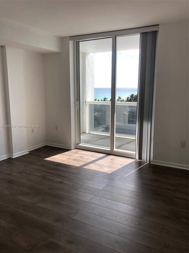 Building Photo - 10275 Collins Ave