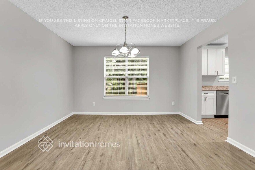 Building Photo - 5614 Carriage Walk Way
