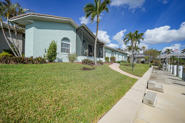 Building Photo - "Waterfront home with Courtyard Pool"