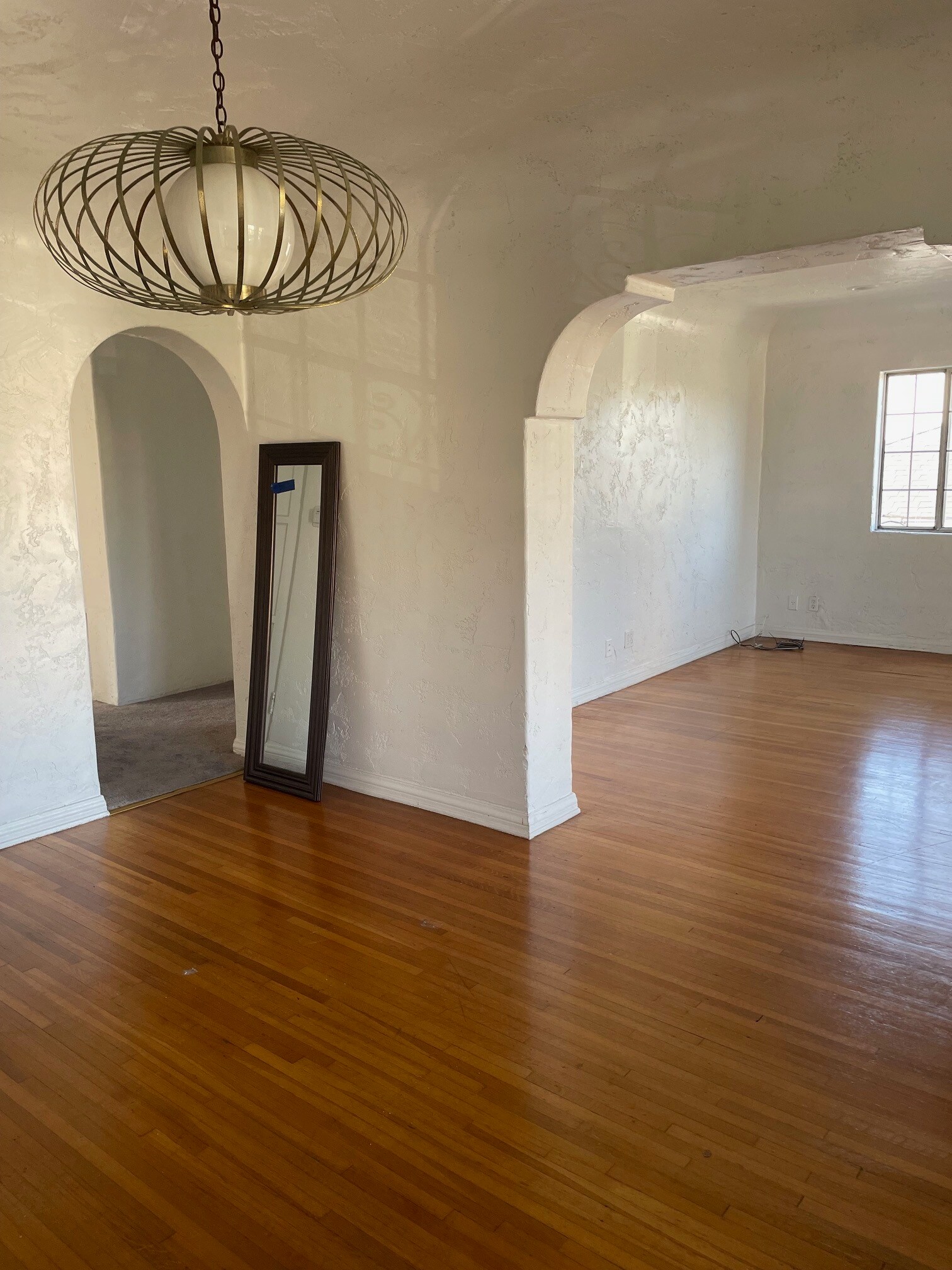 Formal dining room, living room and entry to hallway leading to bathroom and bedrooms - 1416 Ellsmere Ave