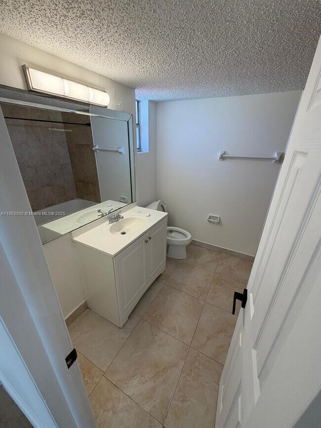 Building Photo - 10701 Royal Palm Blvd