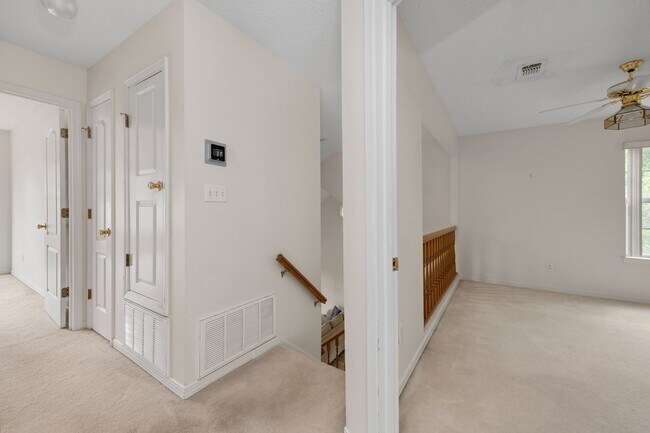 Building Photo - Spacious 3BR Retreat with Soaring Ceilings & Screened Porch