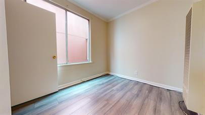 Building Photo - Top-Floor 3BR with Renovated Kitchen Acros...