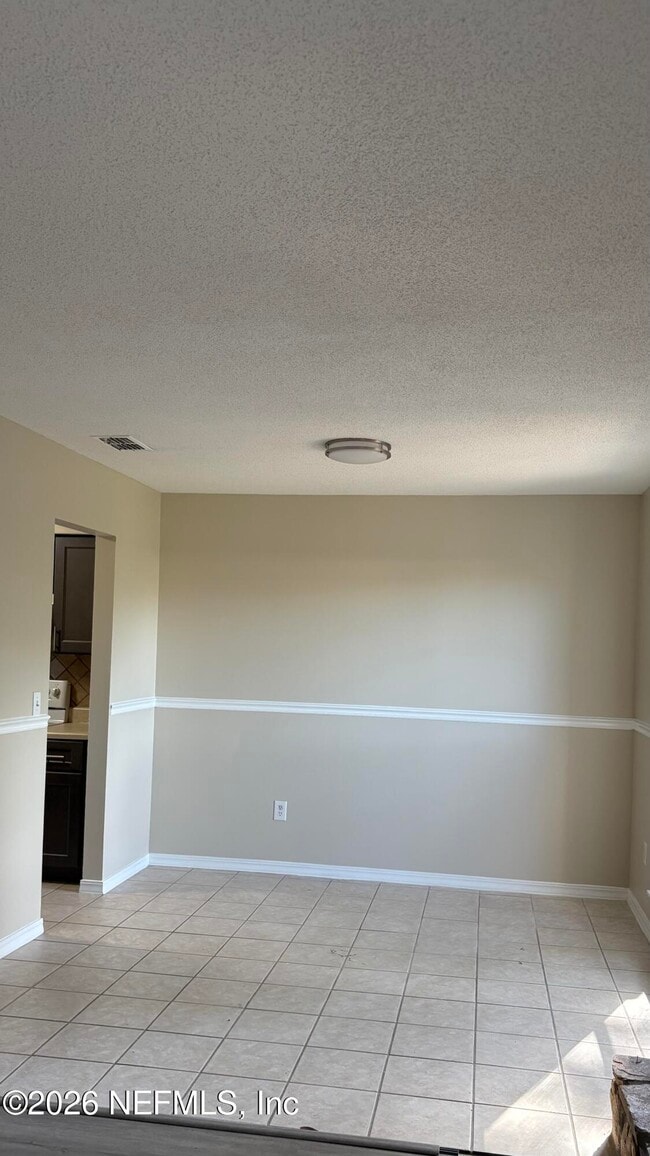 Building Photo - 11467 Fort Caroline Lakes Dr N
