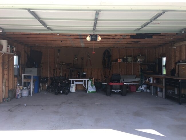 Building Photo - Beautiful secluded 4 bedroom 2.5 bath home with 2 stall detached garage and descent sized yard