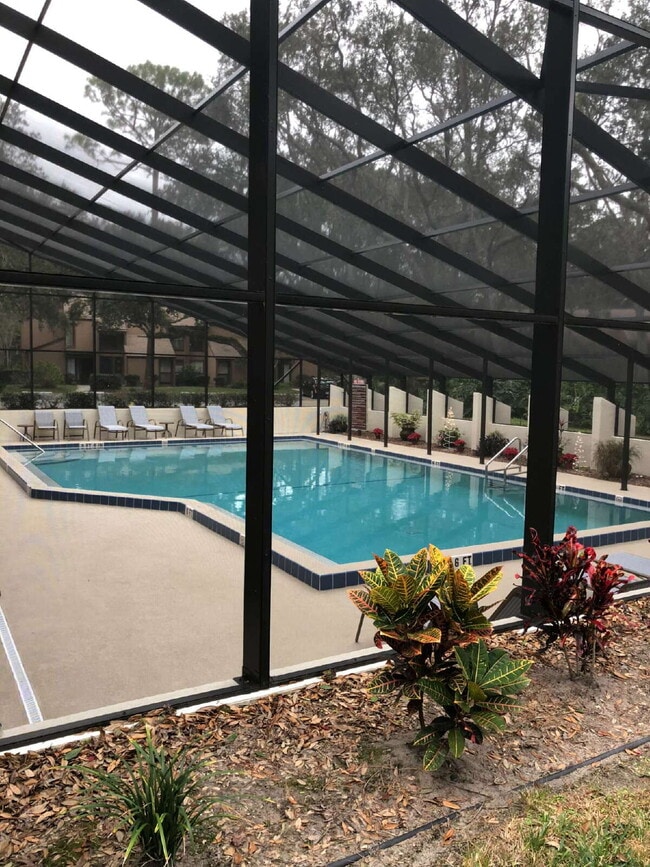 Building Photo - Second floor condo 2/1.5 located at the Fa...