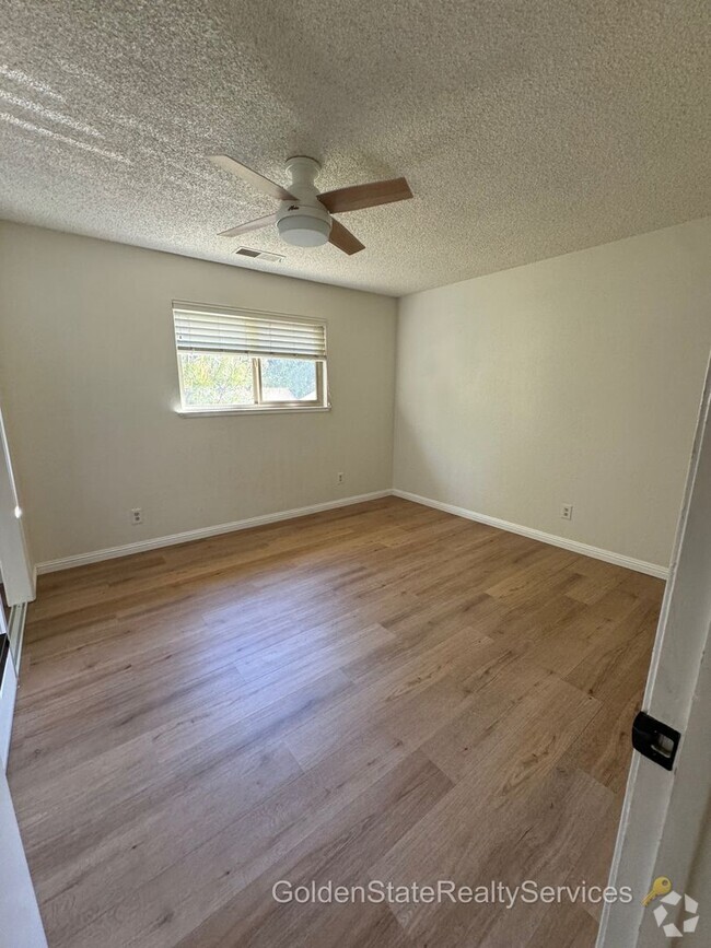 Building Photo - Vacation where you live! Single story home...