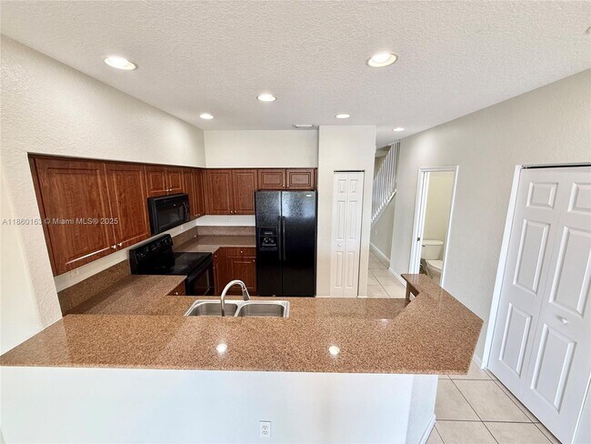 Building Photo - 8380 SW 25th Ct