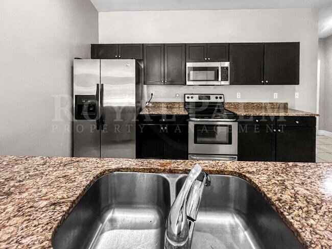 Building Photo - 3BR/2BA Cape Coral Rental - Washer... Dryer... Screened Lanai... This One Came Prepared