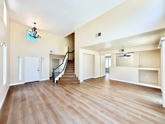 Building Photo - Spacious 5 Bedroom Home with 3 Car Garage & Primary Suite Balcony