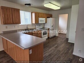 Building Photo - NO deposit option available for qualified ...