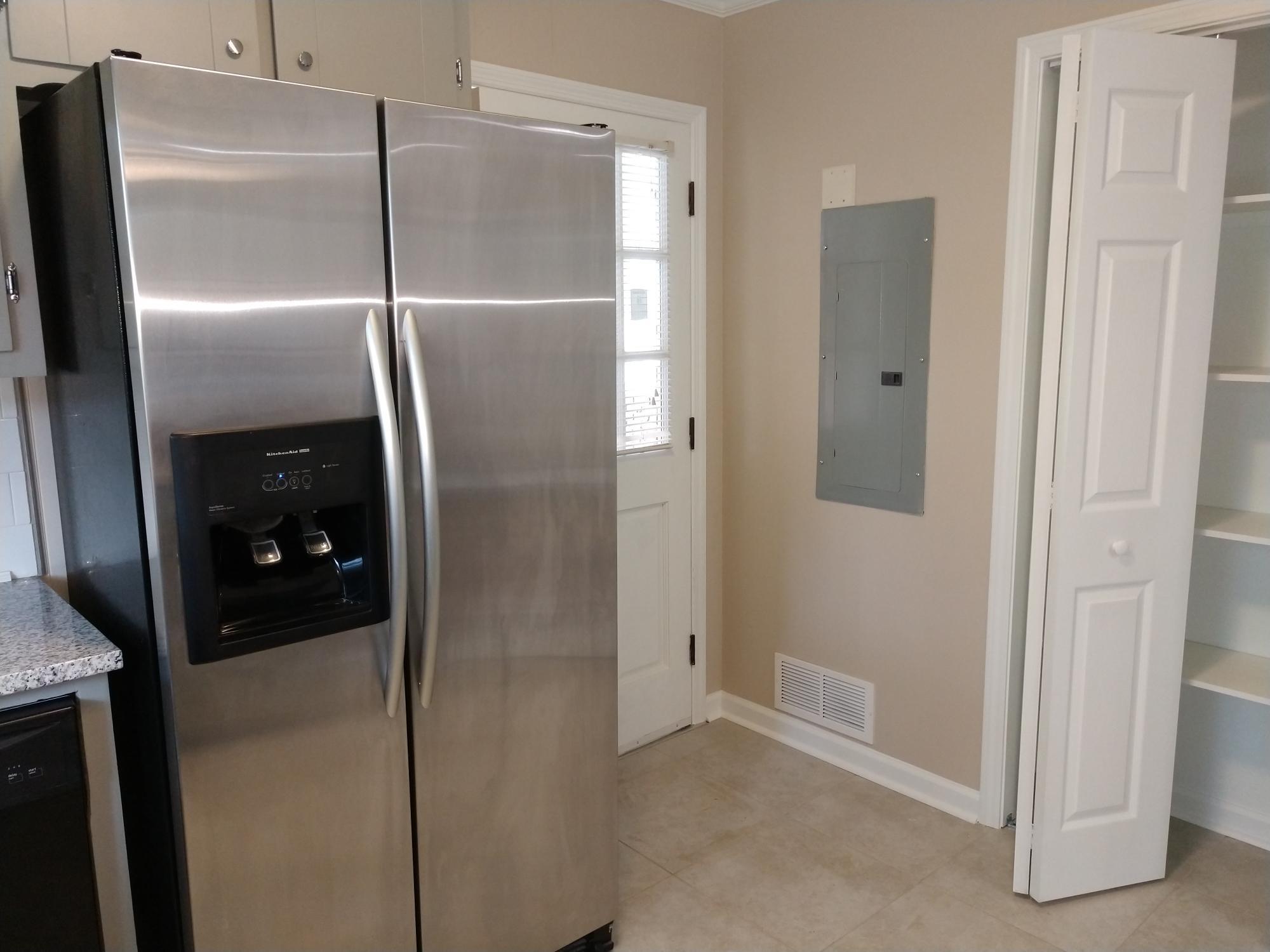 kitchen off the carport entry - 6457 Peacock Blvd